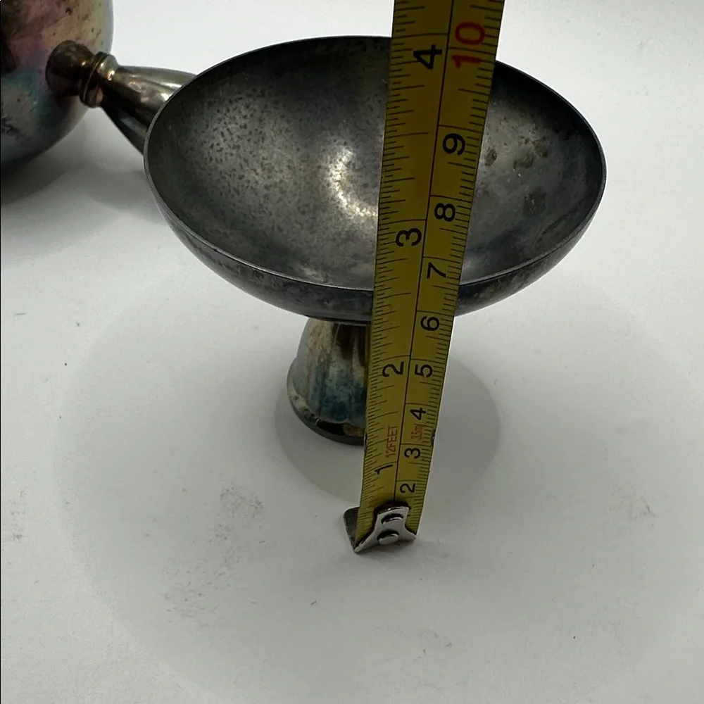 Pair of vintage Oneida Silversmiths silver-plated candle holders. Mid-century.
